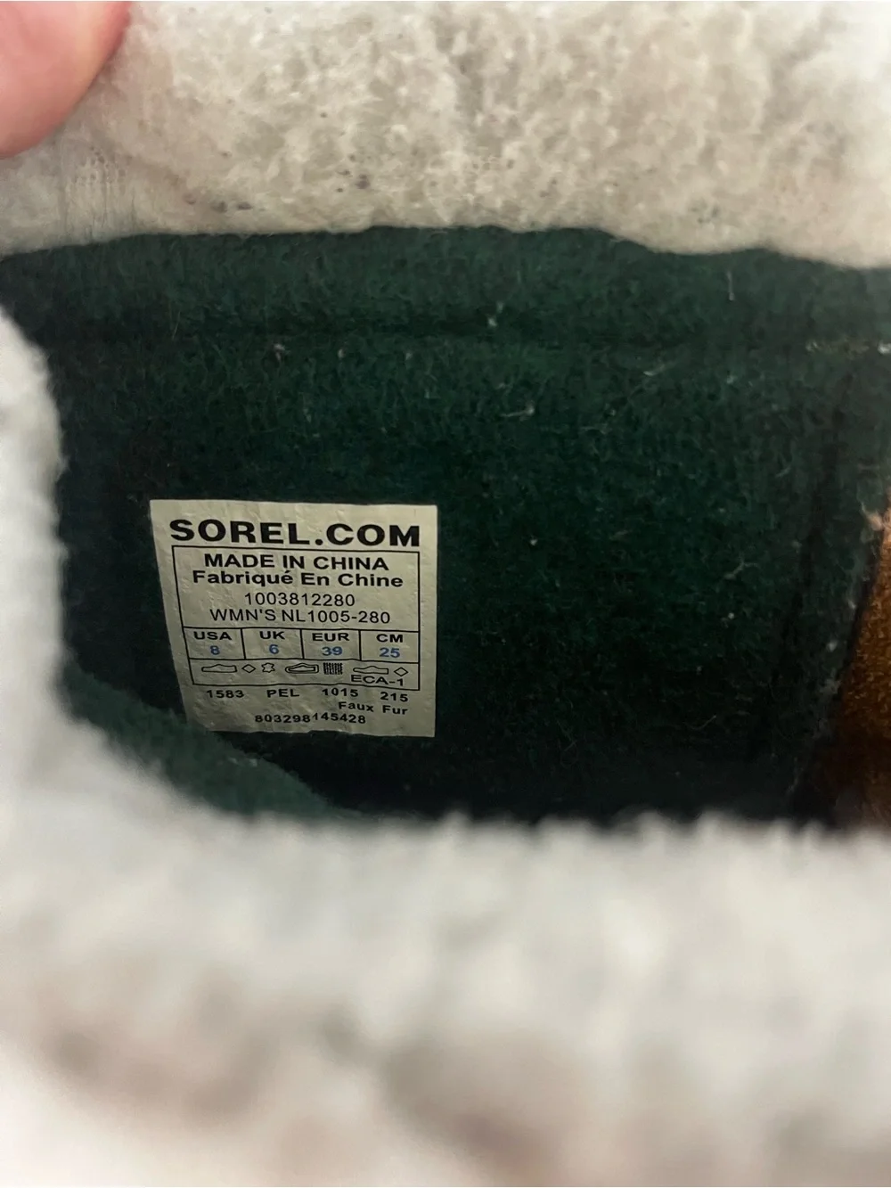 Sorel Tan and Black Caribou Winter Boots